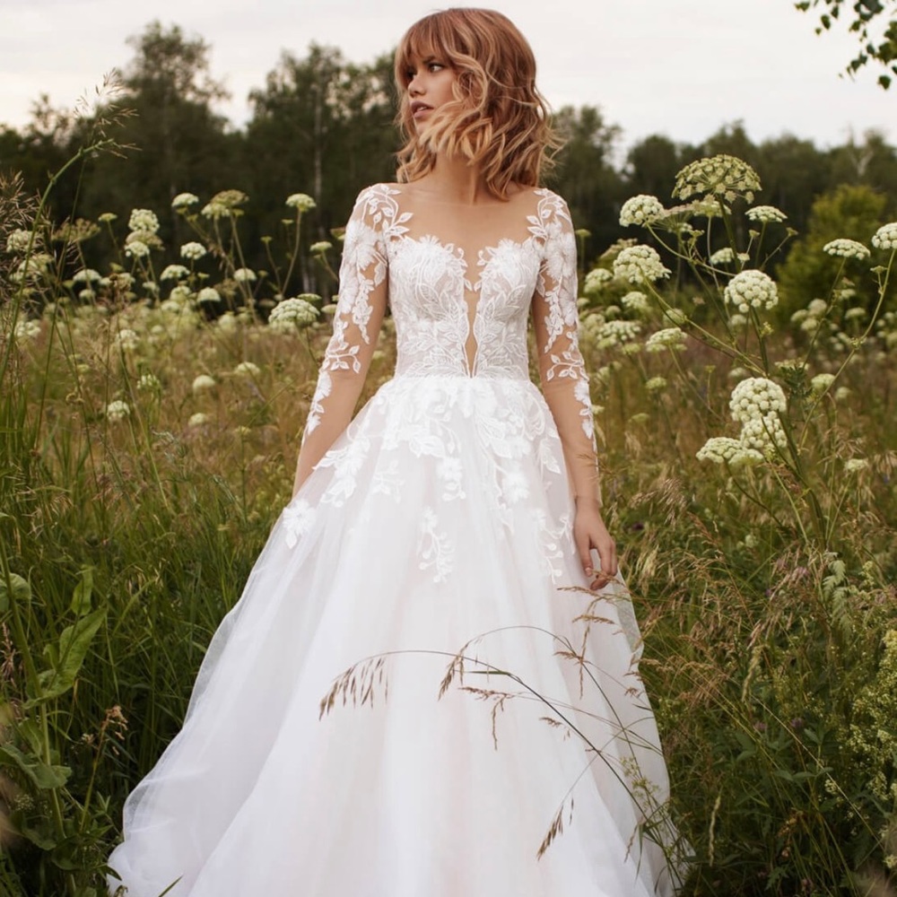 Long-sleeve lace ball gown wedding dress